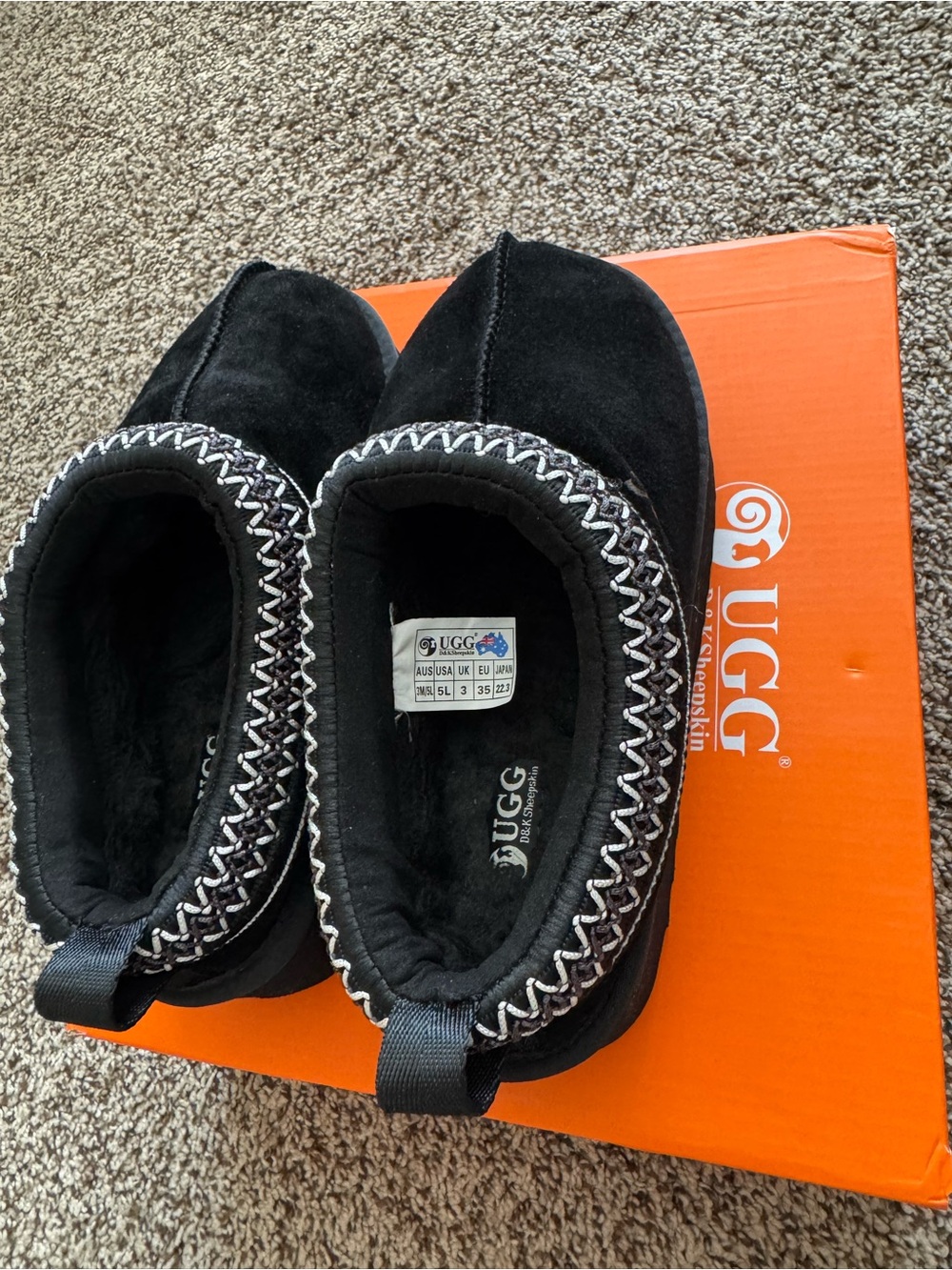 UGG Kids Black Suede Slip-On Slippers with White Contrast Stitching